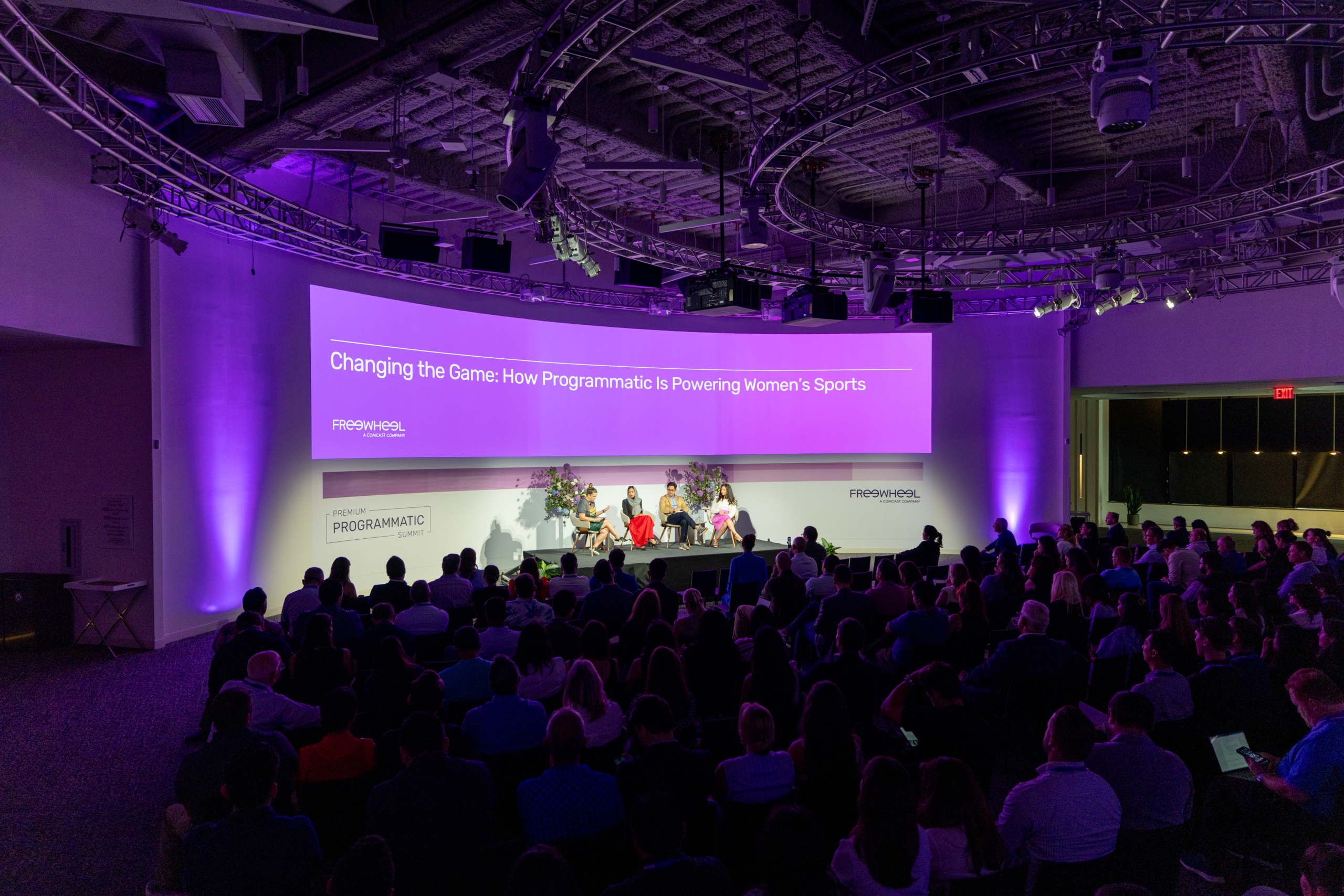 Panelists speaking on stage at Premium Programmatic Summit
