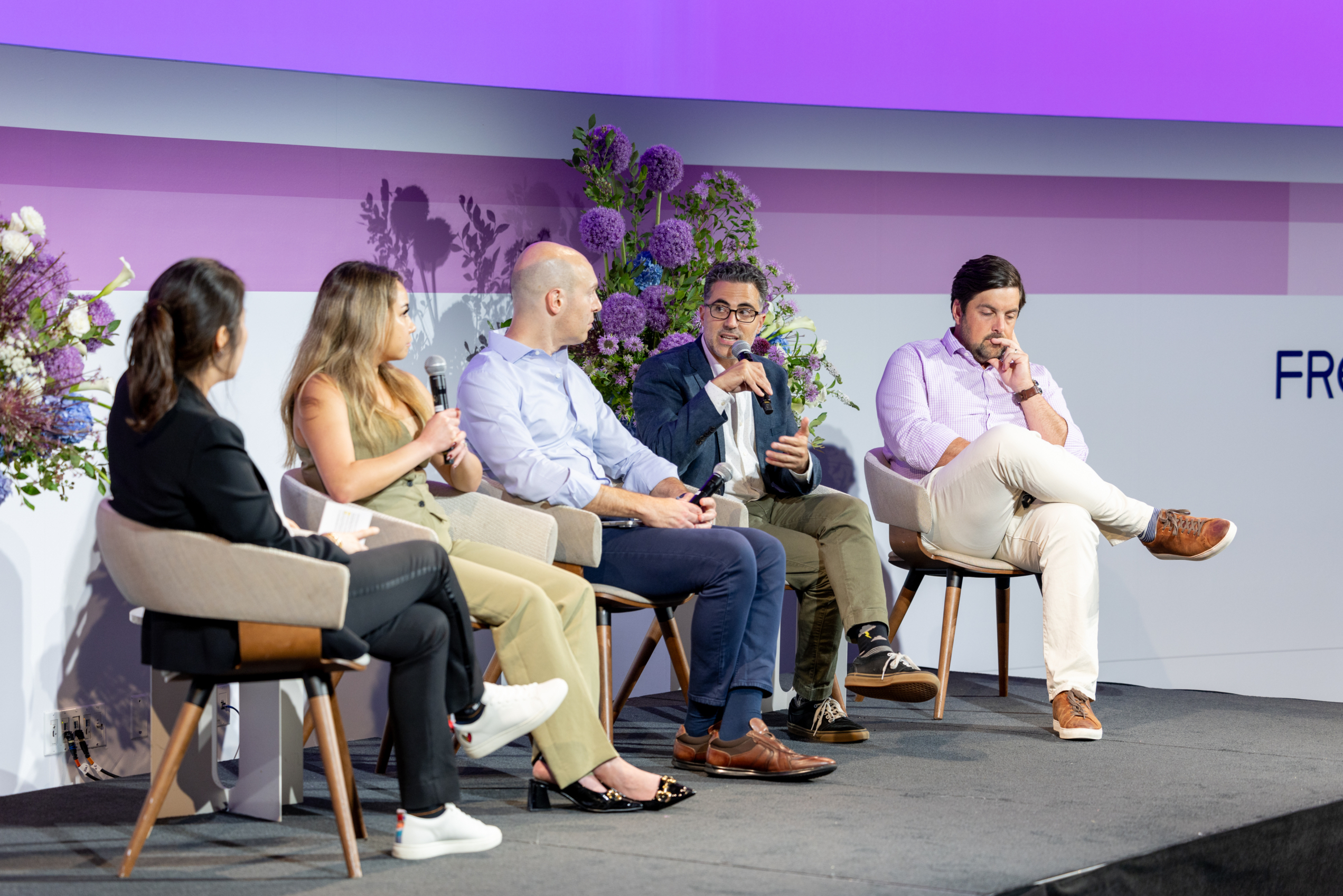 Panelists speaking on stage at Premium Programmatic Summit