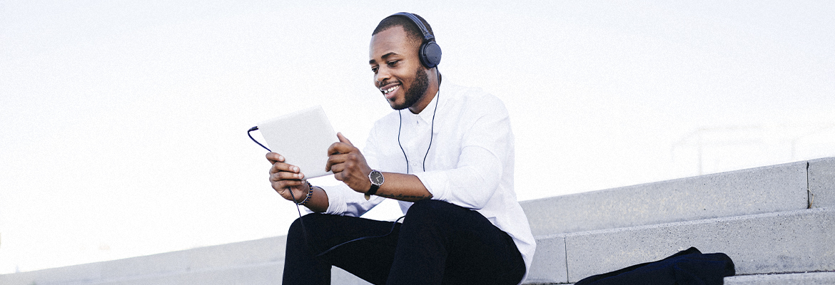 Man looking at tablet