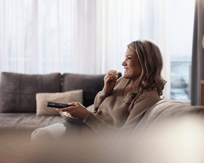 French woman watching TV